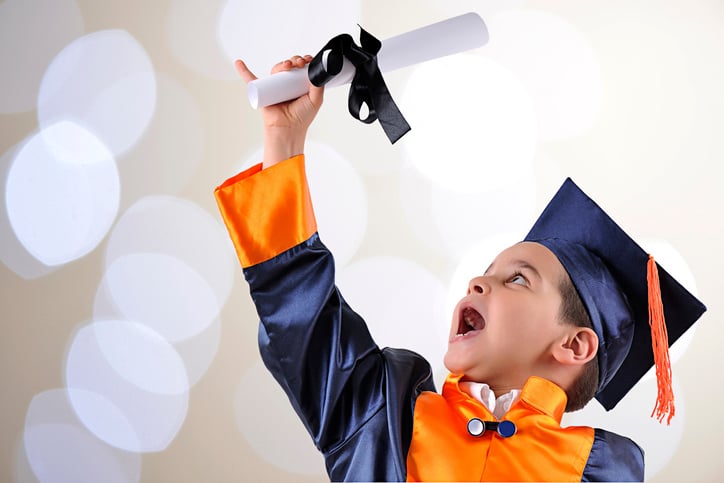 Graduate Boy over Bokeh Background