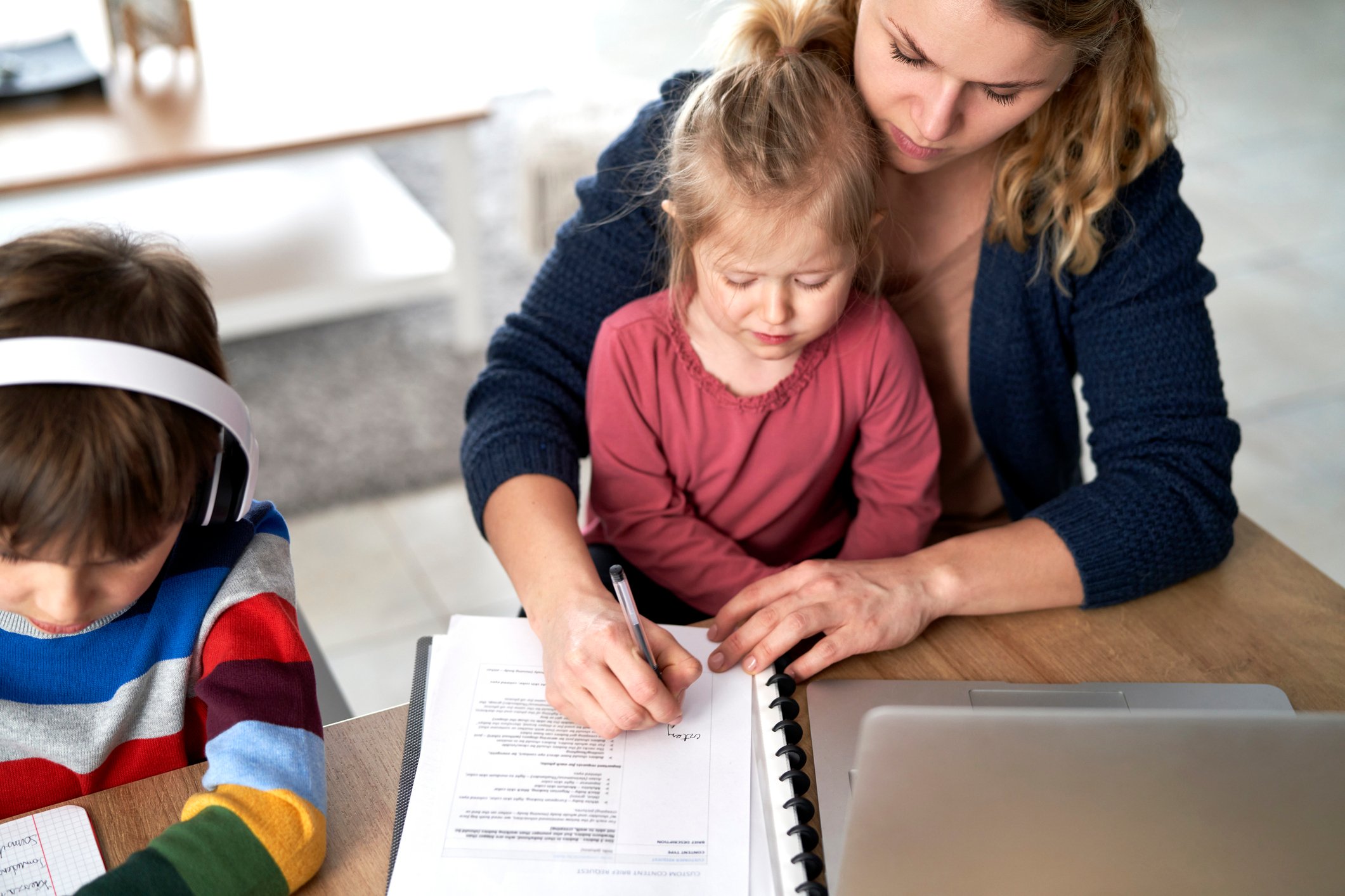 Parent filling out childcare forms