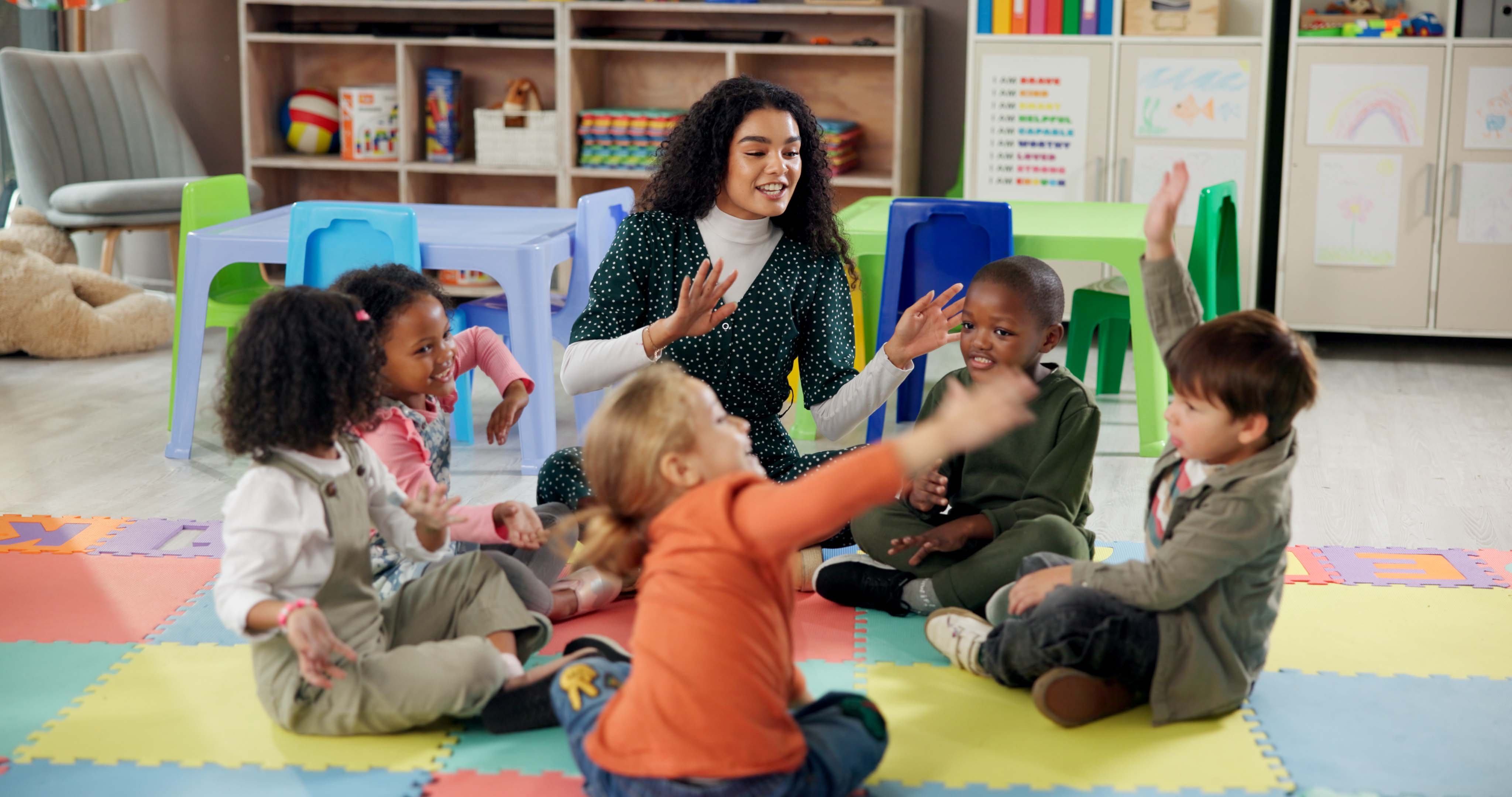 Preschool teacher and her students