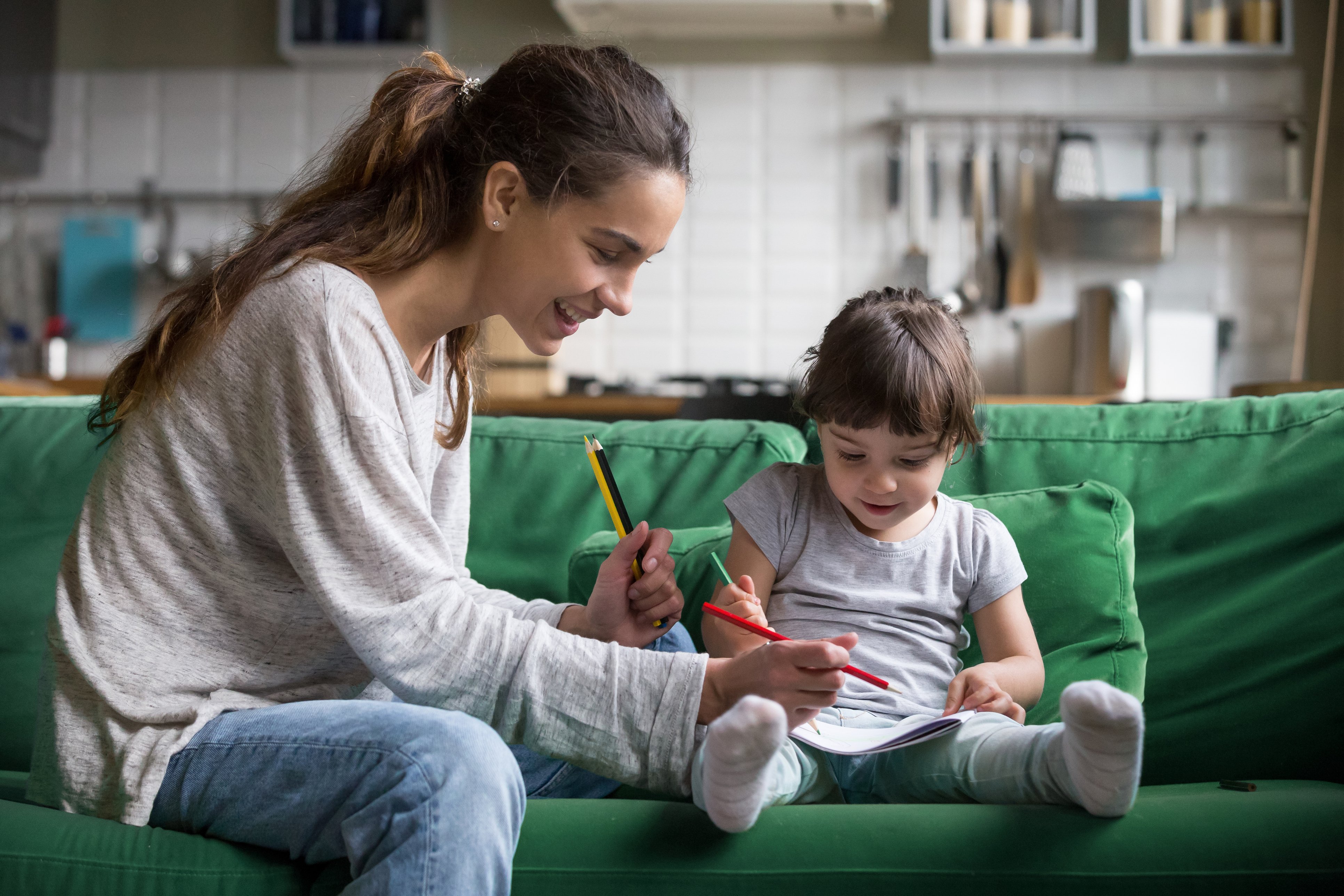 mother teaching young child