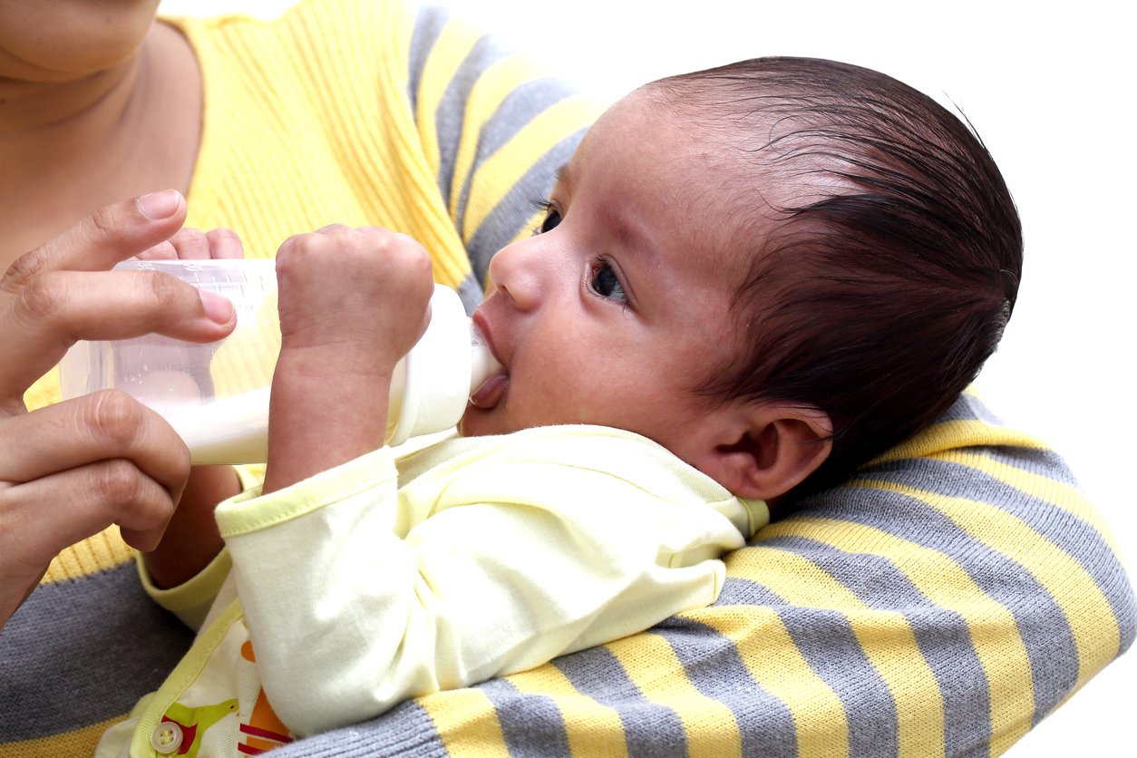 baby drinking from bottle