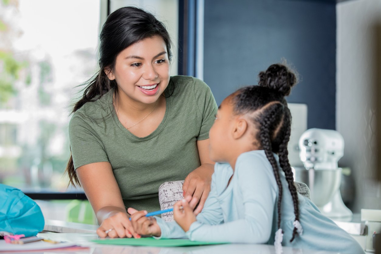 Child care provider and girl