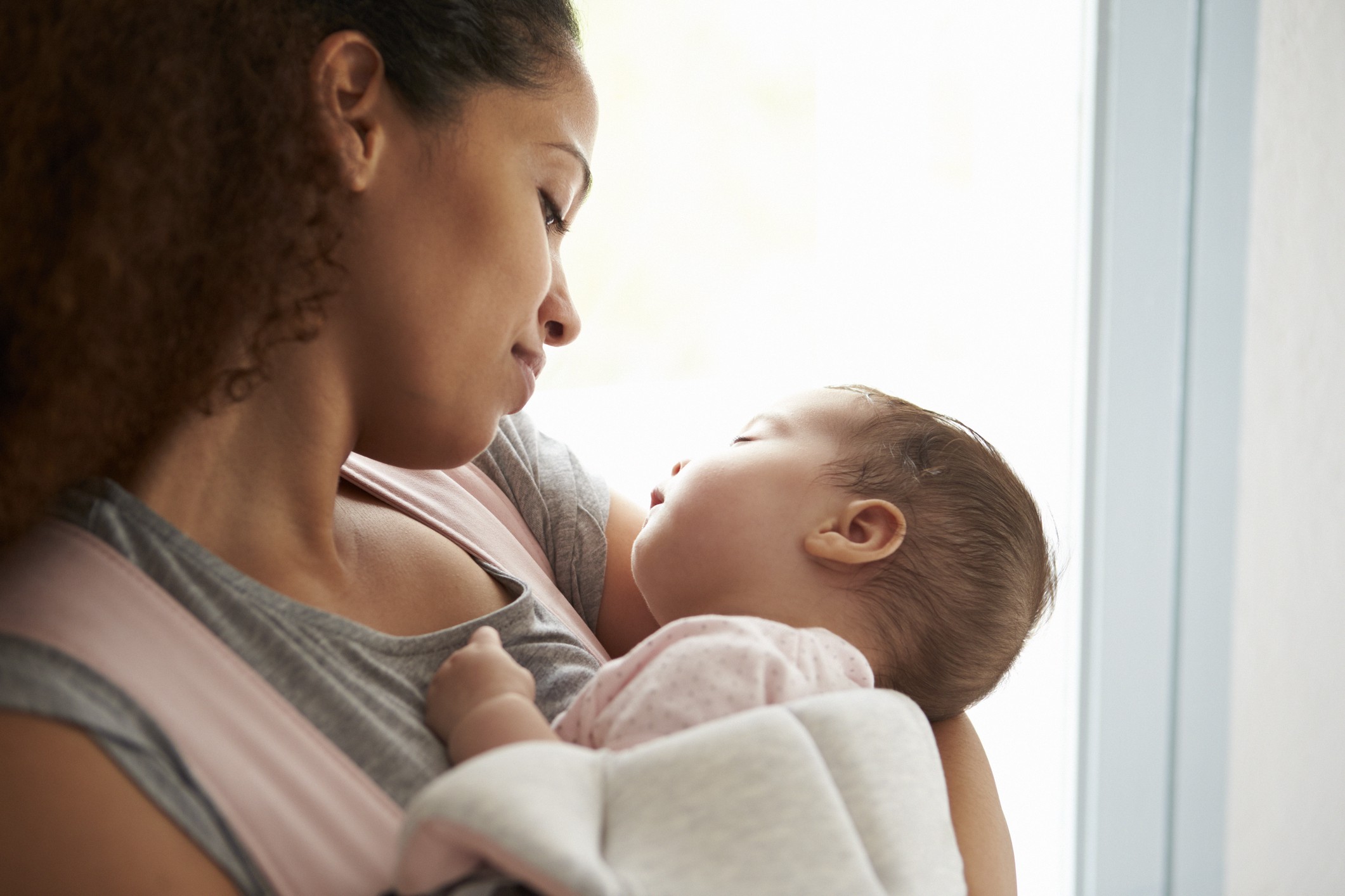 new parent with baby