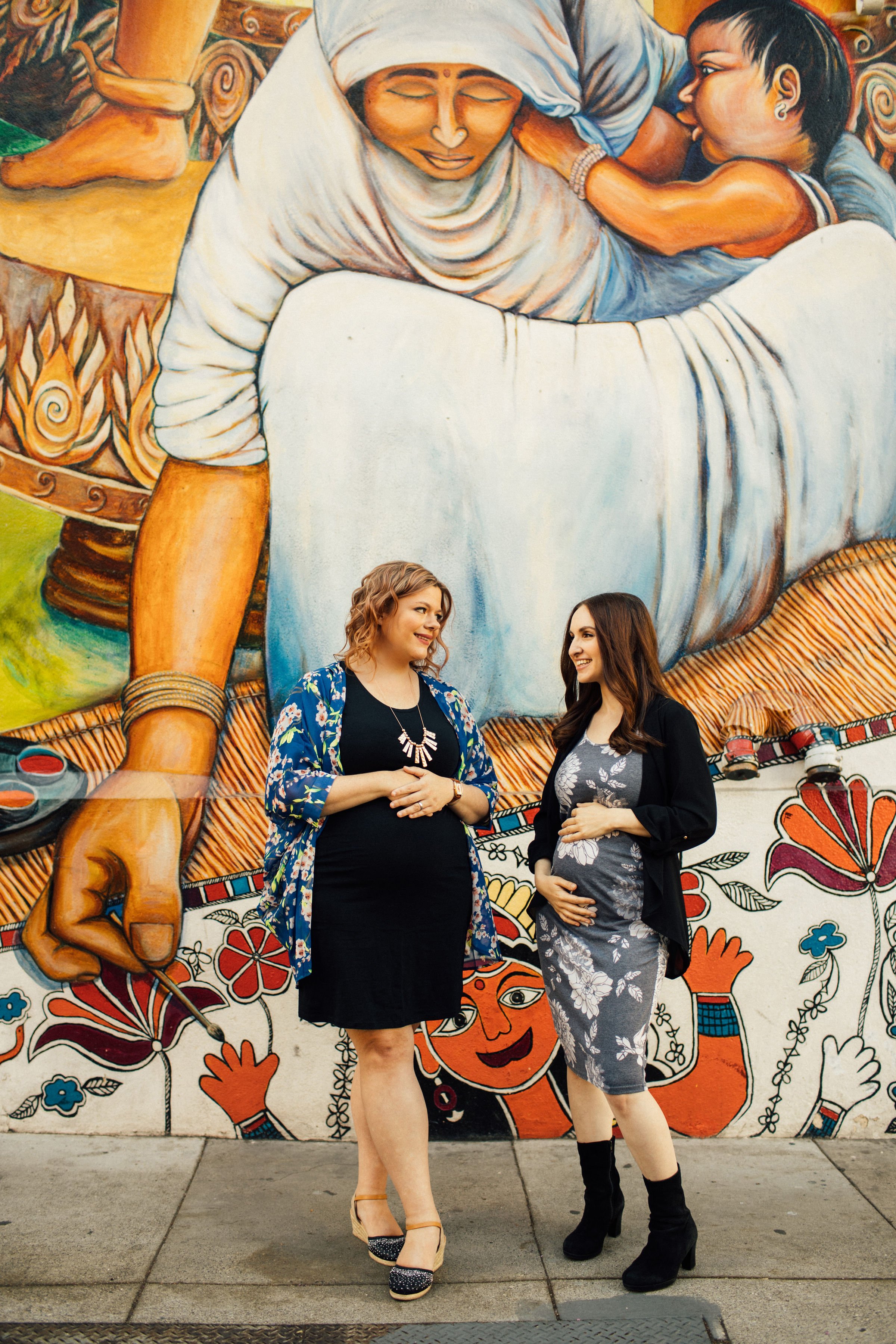 Sara and Anne in front of mural