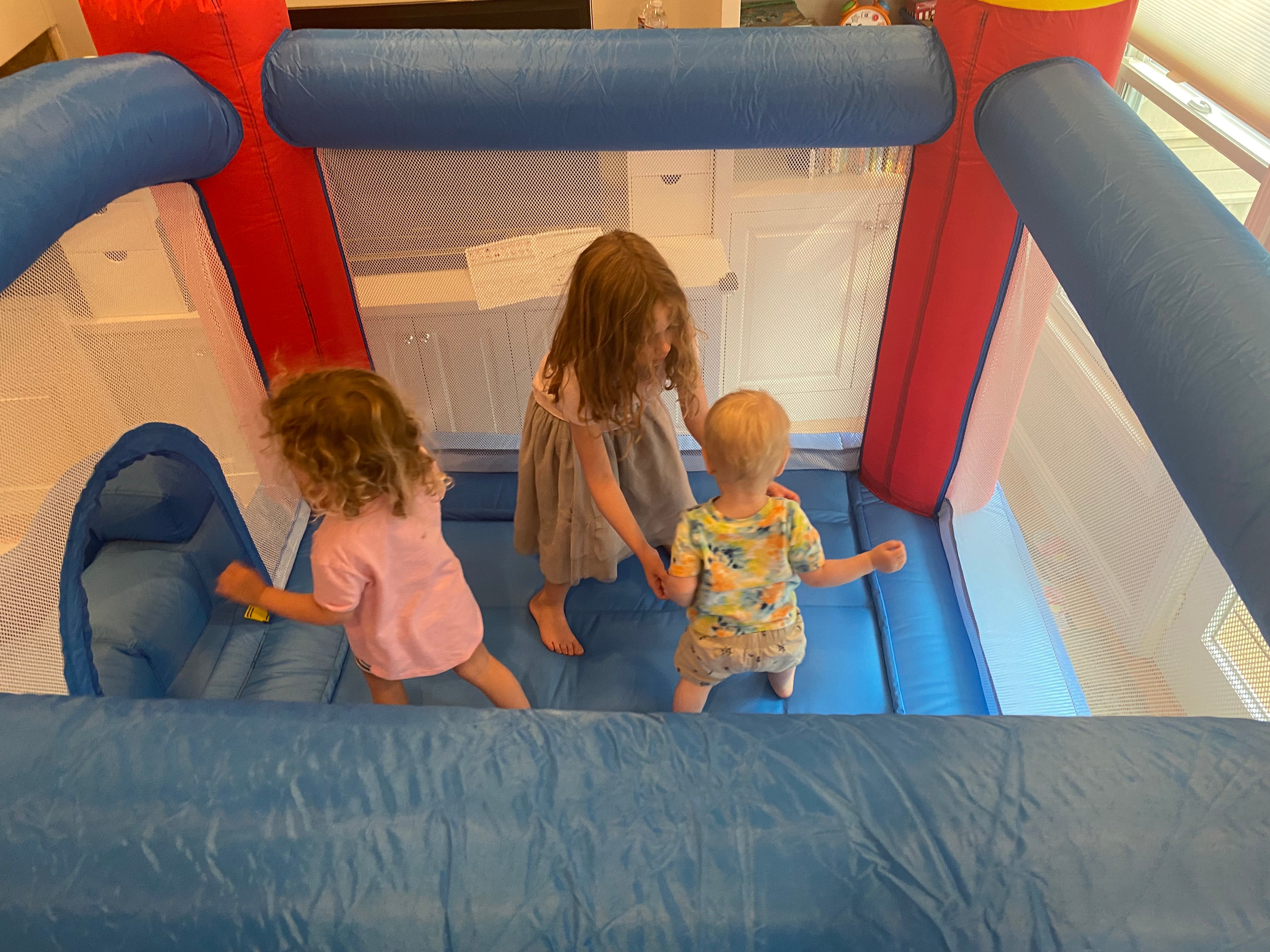 Kids jumping in bounce house