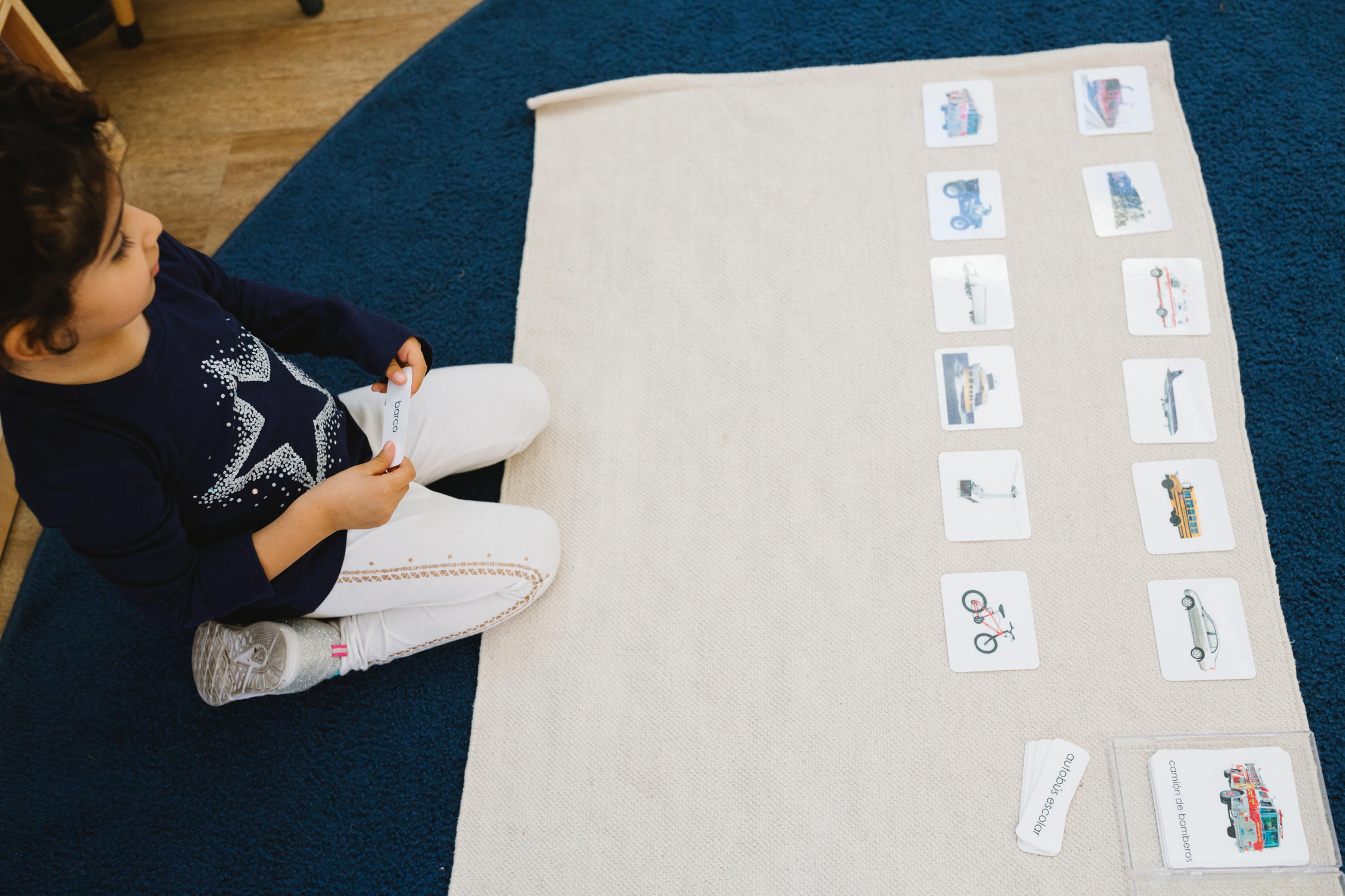 child playing with cards